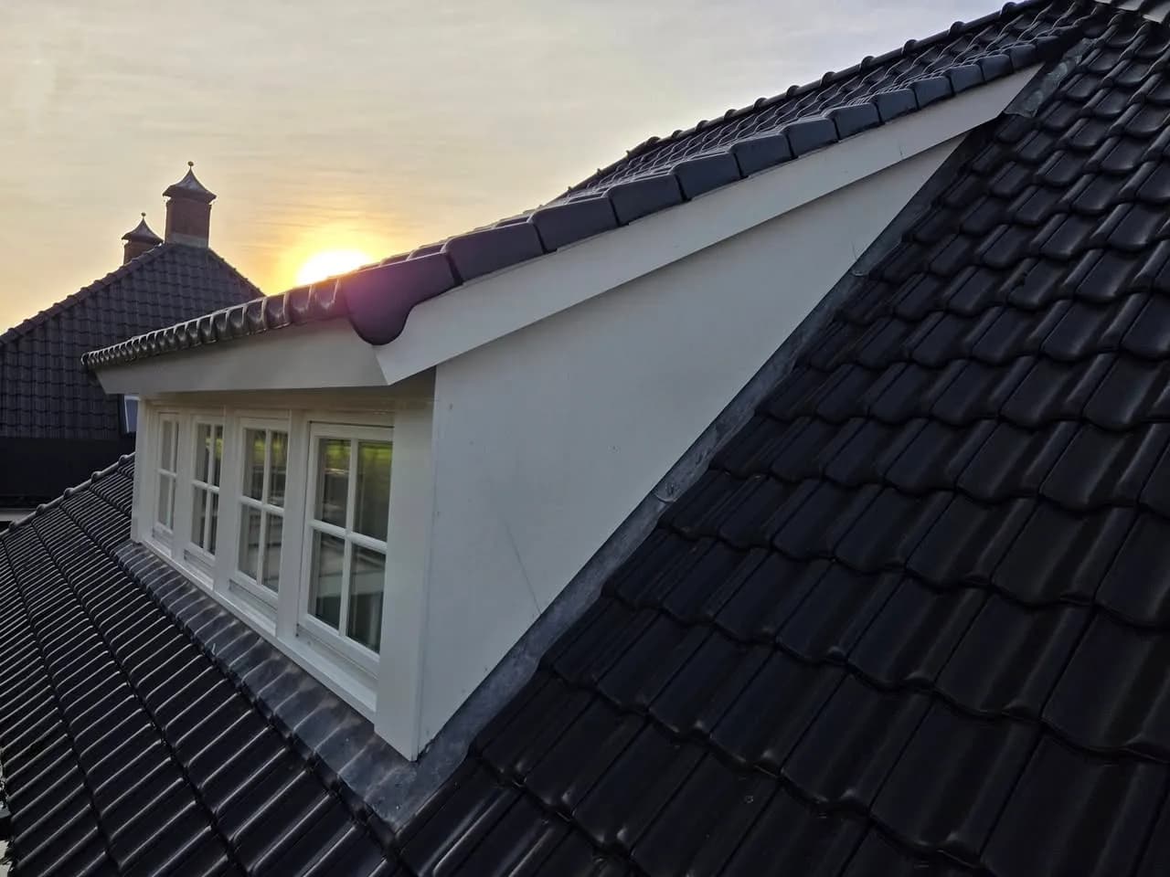 Dakkapel zijkant bekleed met Trespa
