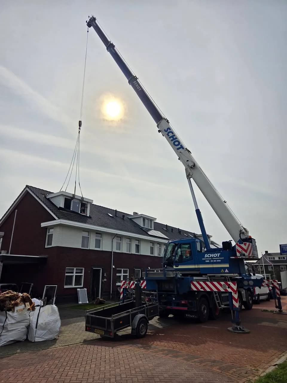 Timmerwerk rond geplaatste dakkapel